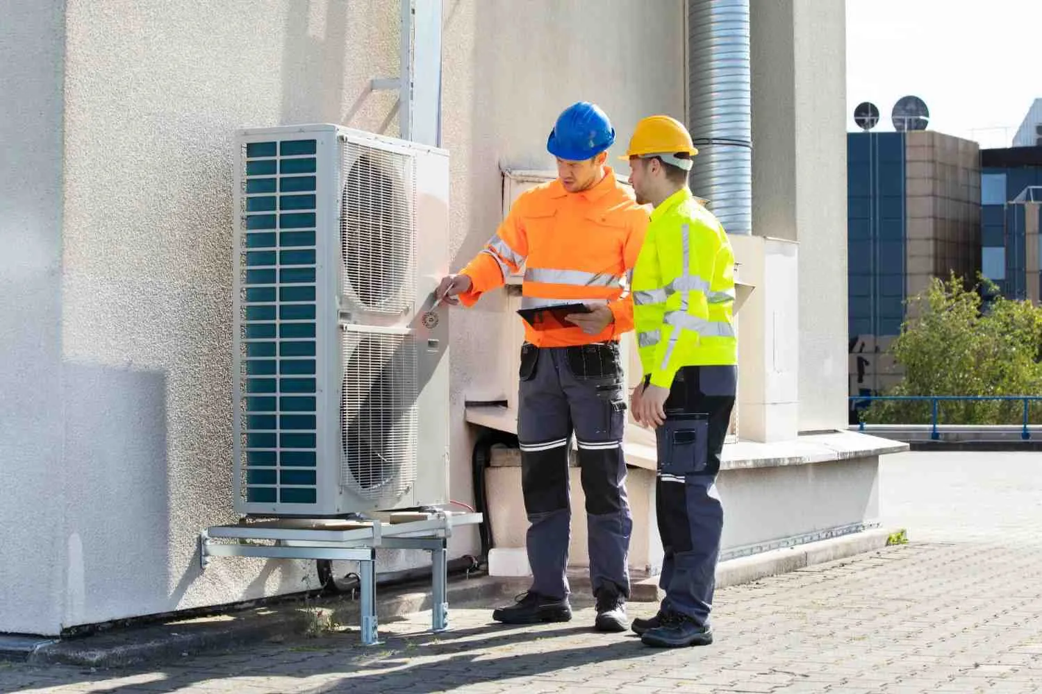 Home heating and cooling unit being serviced